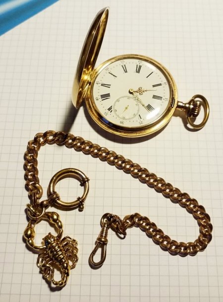 Uhrenbestimmung Taschenuhr mit Kette und Skorpion