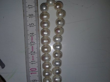 bitte um eine schätzung dieser perlen kette