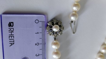 Einschätzung zum Wert einer Perlenkette mit aufwändigem Verschluss und Punze