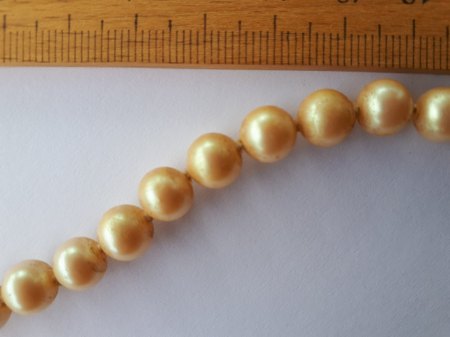 Bitte um Wertschätzung einer Perlenkette