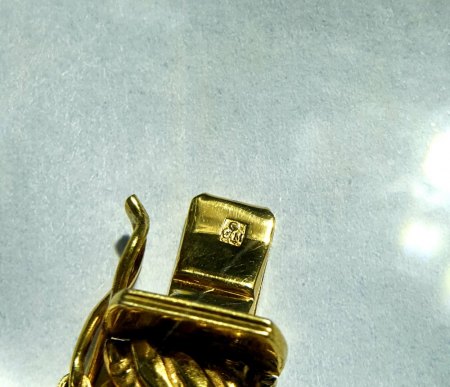 Punze auf Gold Armband