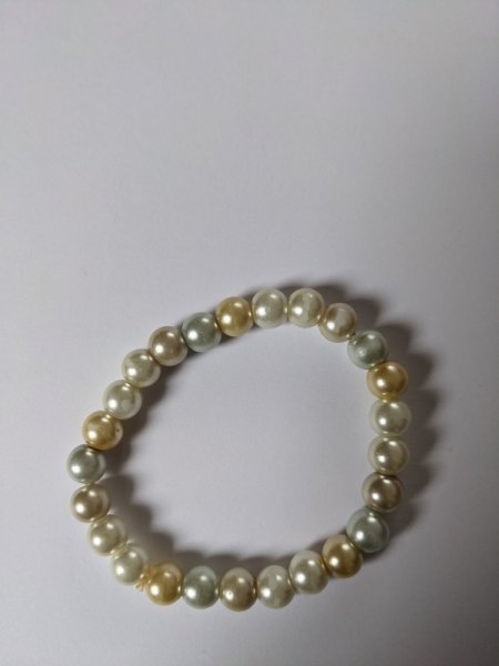 2 Schmuckstücke (Perlenkette und Ring)