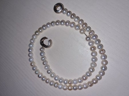 Perlenkette Verschluss Bedeutung