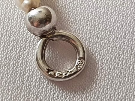 Granat perl silver necklace Whi Is The Maker?