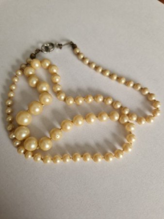 Wie erkenne ich, ob es echte Perlen sind?