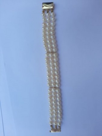 Wertschätzung von Perlencollier, Perlenkette und Perlenring