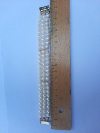 Wertschätzung von Perlencollier, Perlenkette und Perlenring