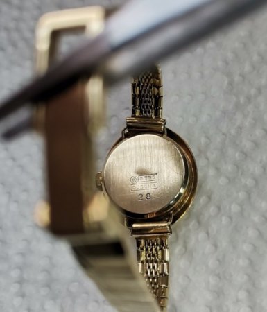 2 goldene Uhren eine ist Marke Dugena/ Citizzen Quartz